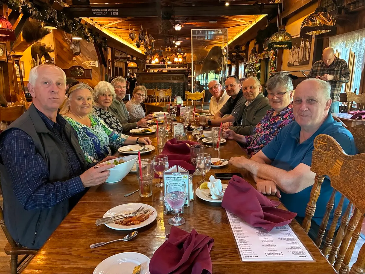 Tour guests sharing lunch at a local restaurant